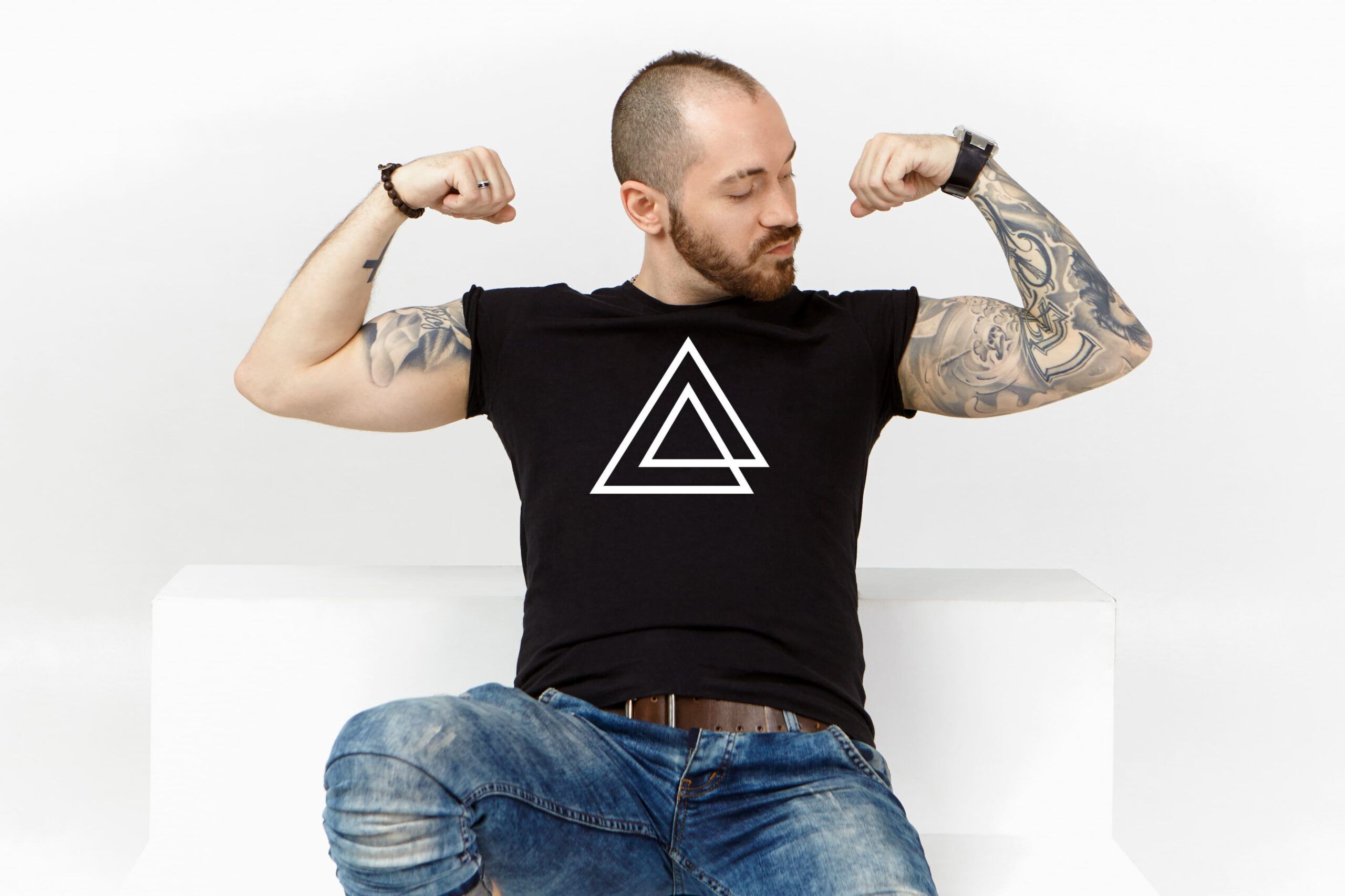 strong-male-bodybuilder-with-stubble-stylish-hairdo-tattooed-arms-demonstrating-his-biceps-tensing-muscles-after-weightlifting-exercise-feeling-proud-himself-posing-isolated-studio (9) (1)